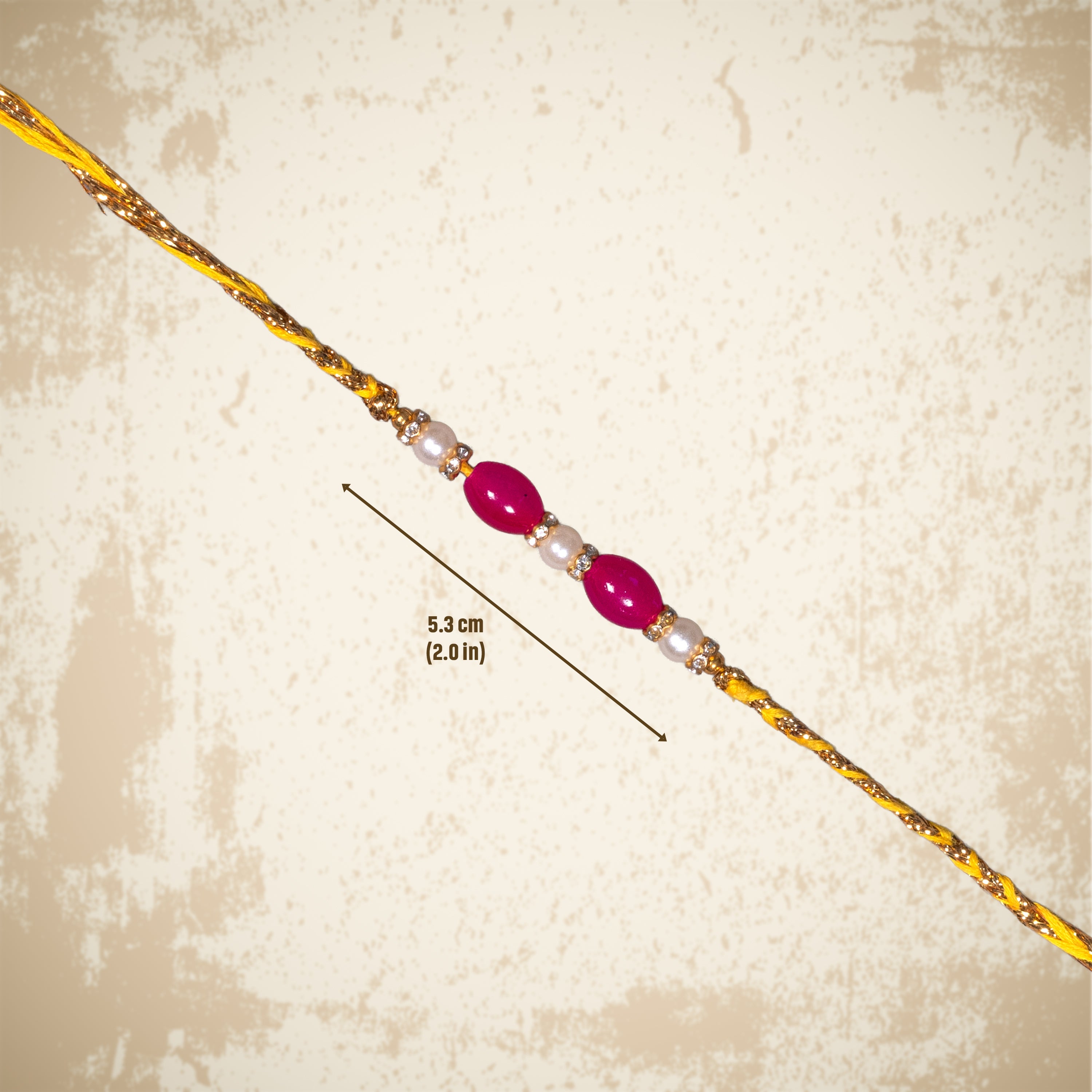 Handmade Rakhi - Ruby Pearl 1pc